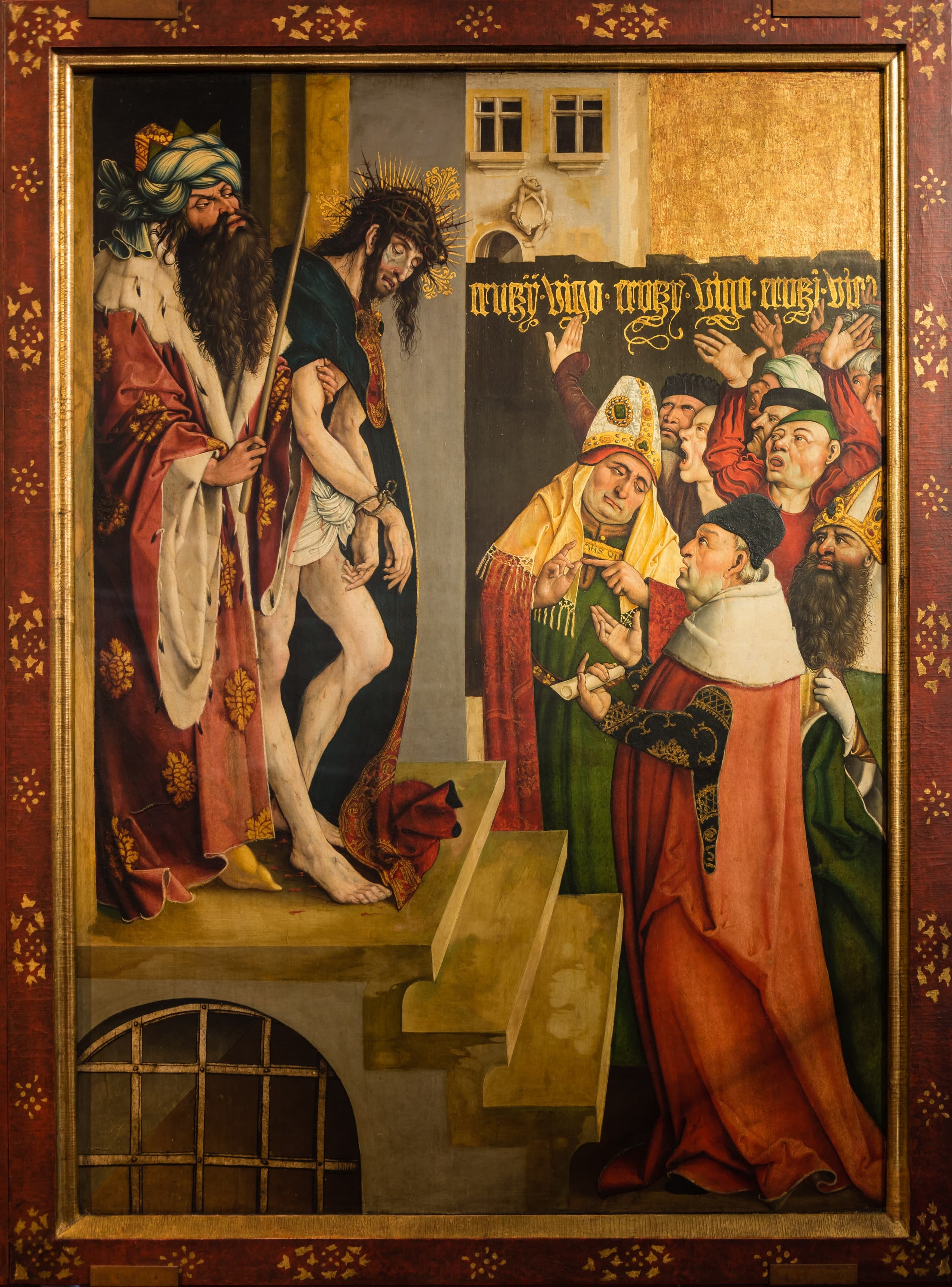 A small fresco of Christ crowned with thorns; the face has been heavily overpainted in blunt, simplified strokes that obscure the original features.