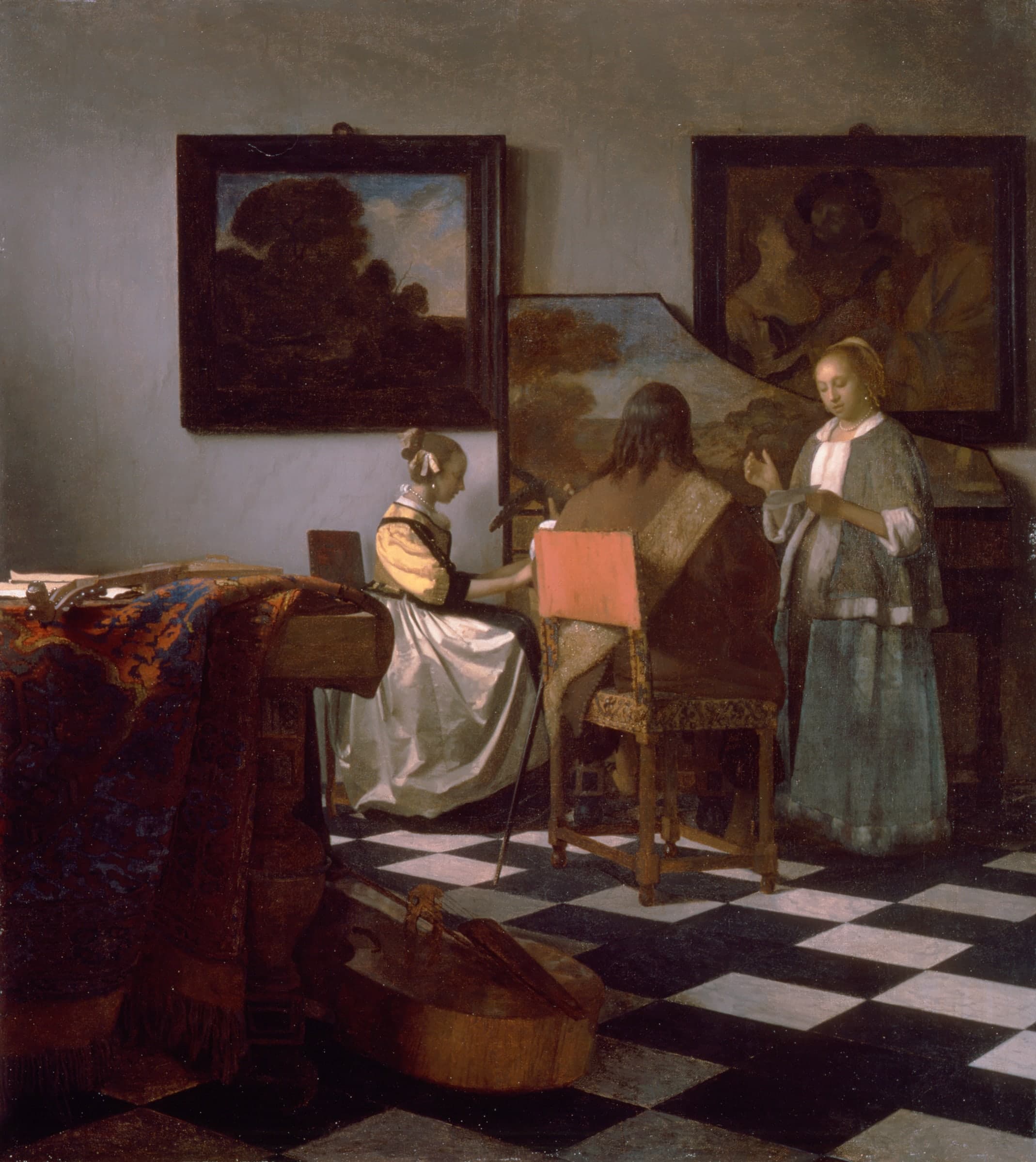 A compact oil painting of a man and two women performing music together in an interior.