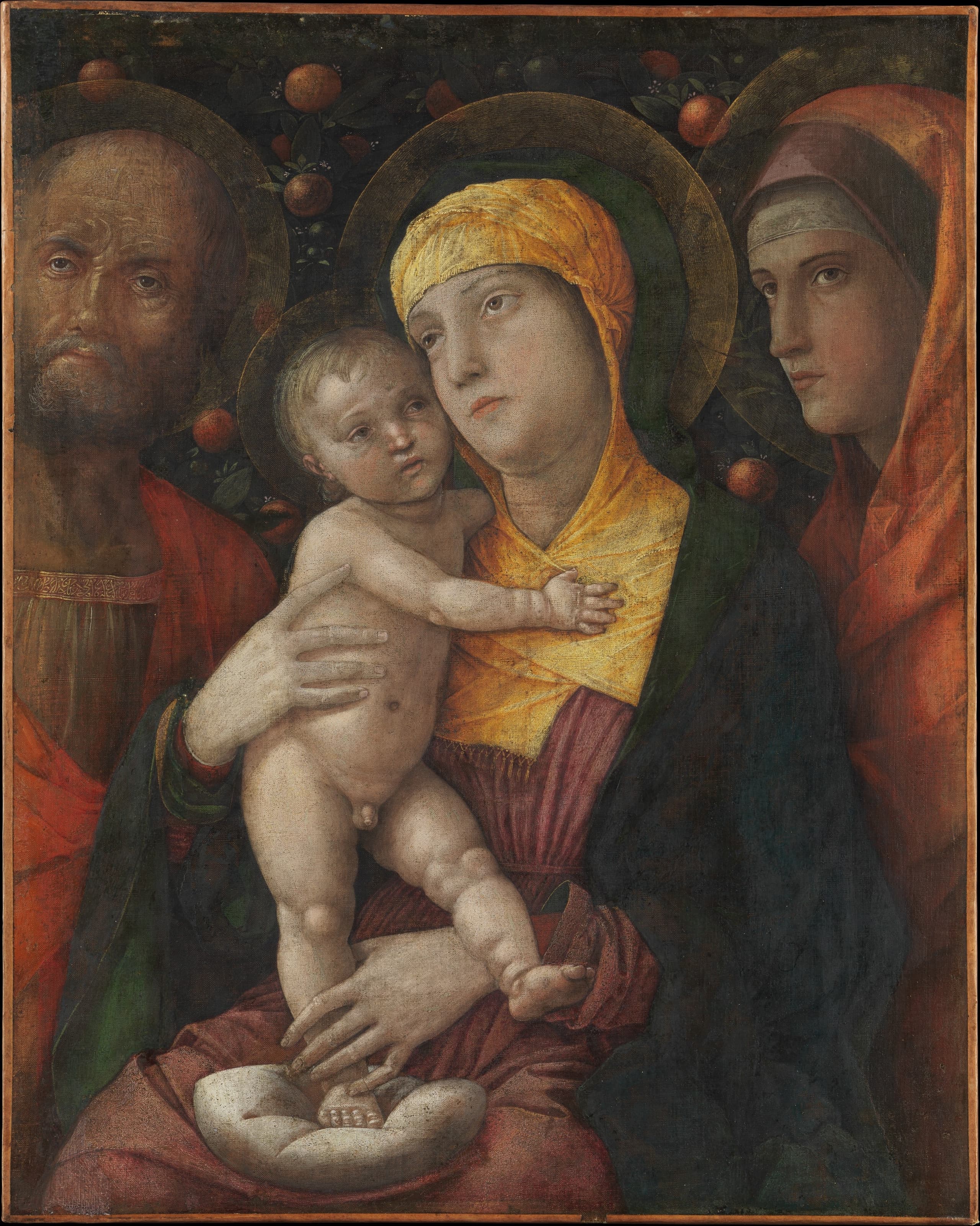 A small tempera painting of the Virgin, Child and Joseph with Saint Mary Magdalen, set close to the viewer before a dense hedge laden with fruit.