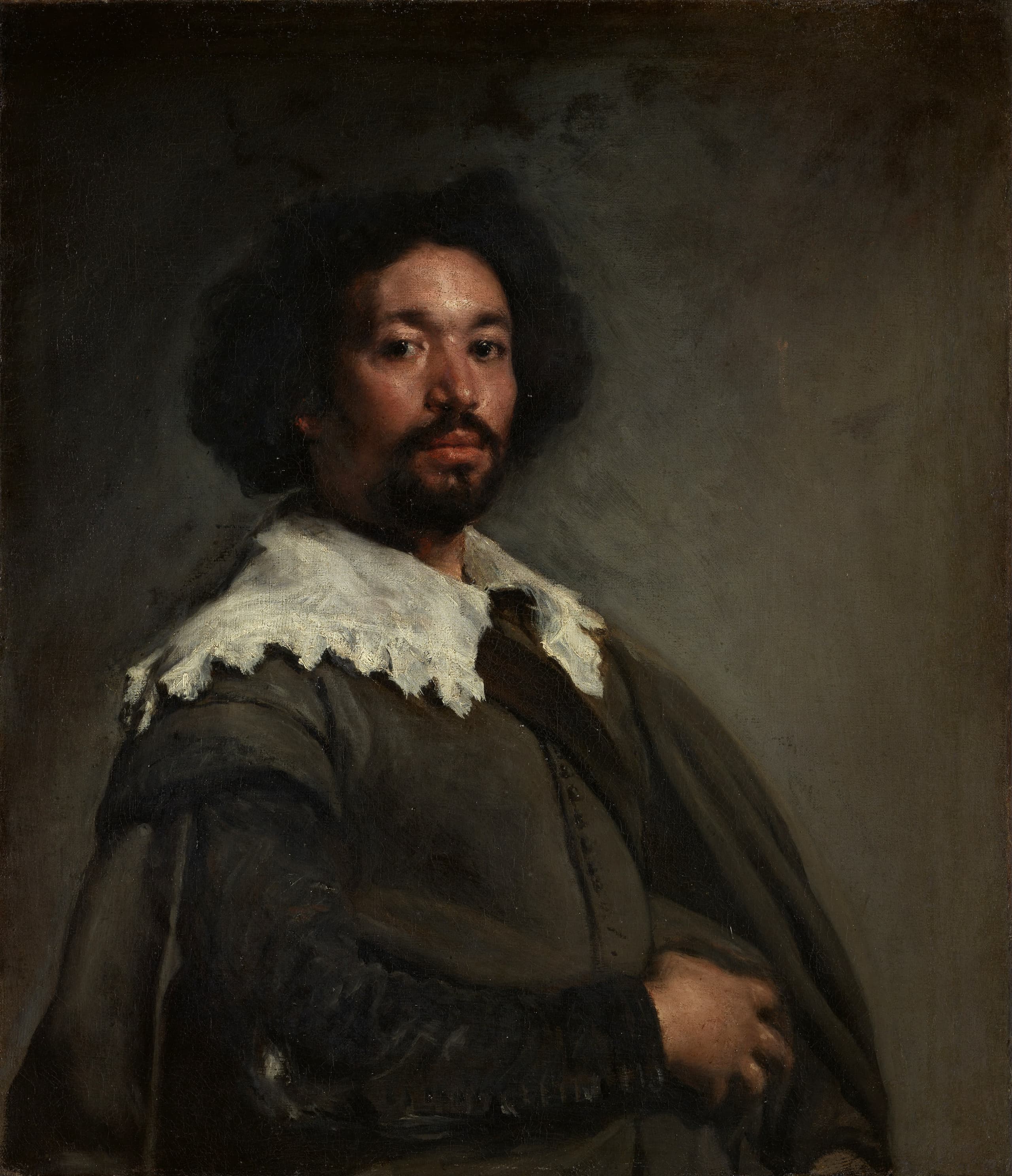 A vertical oil-on-canvas portrait painting of Juan de Pareja, measuring 81.3 by 69.9 centimetres (2 ft 4 in).