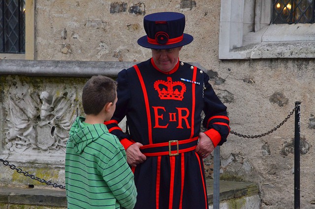 Tourists and Beefeaters in daylight at the Tower
